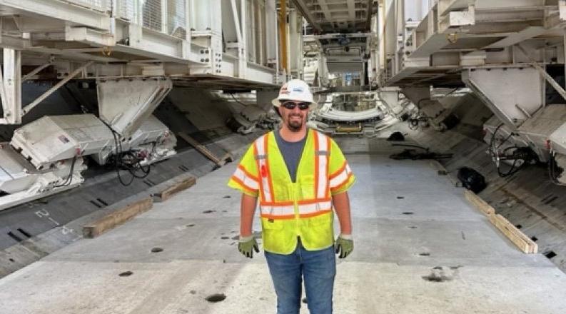 engineering major stands in front of HRBT project